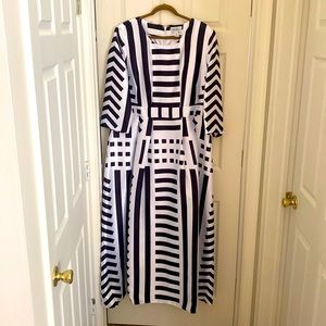 B & W t-length dress, 20W, fully lined. Smoke free environment and no pets.